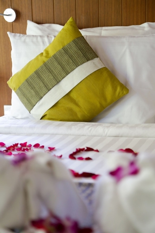 Imagen de la habitación del Hotel Samui Honey Cottages Beach Resort. Foto 16