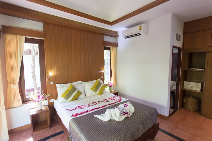Imagen de la habitación del Hotel Samui Honey Cottages Beach Resort. Foto 17