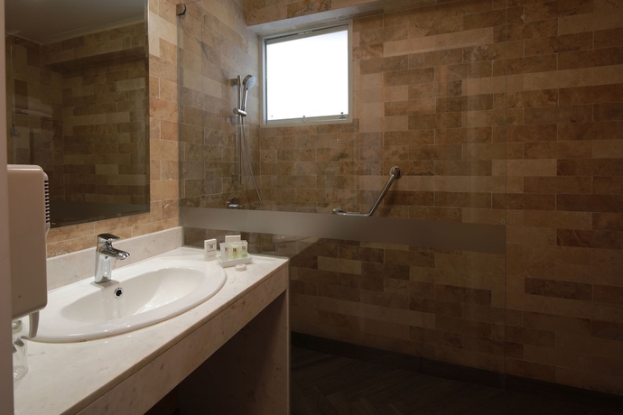 Imagen de la habitación del Hotel San Agustin Posada Del Monasterio. Foto 17