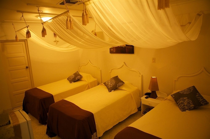 Imagen de la habitación del Hotel San Andres Noble House. Foto 8