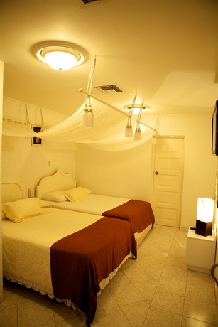 Imagen de la habitación del Hotel San Andres Noble House. Foto 9