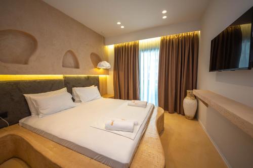 Imagen de la habitación del Hotel San Angelo Luxury Resort - Adults Only. Foto 15