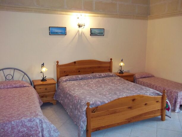 Imagen de la habitación del Hotel San Antonio Guest House. Foto 15