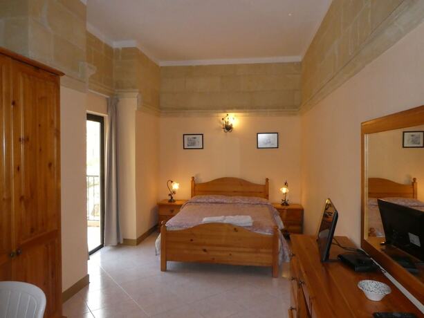 Imagen de la habitación del Hotel San Antonio Guest House. Foto 17