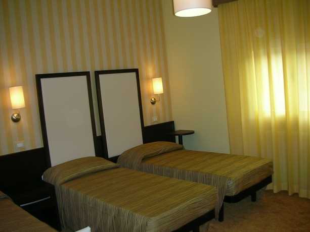 Imagen de la habitación del Hotel San Carlo Cesenatico. Foto 10