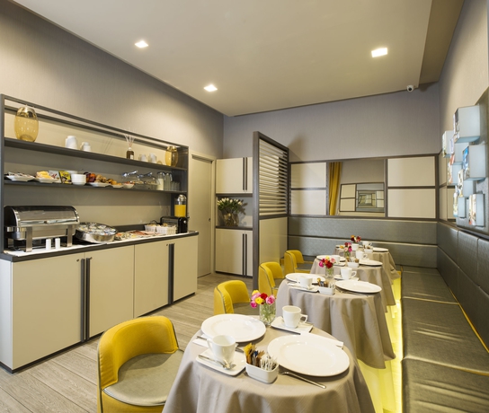 Imagen del bar/restaurante del Hotel San Carlo Suite. Foto 7