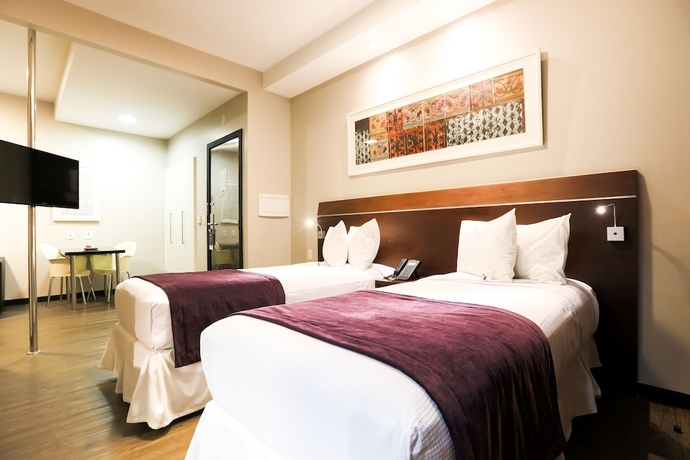 Imagen de la habitación del Hotel San Diego Su&iacute;tes Ipatinga. Foto 6