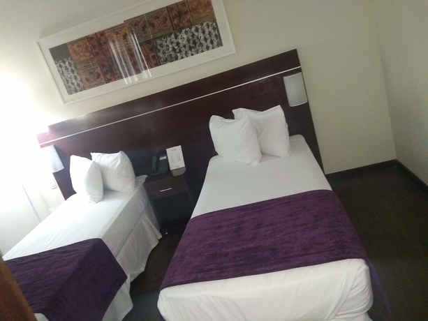 Imagen de la habitación del Hotel San Diego Su&iacute;tes Ipatinga. Foto 7