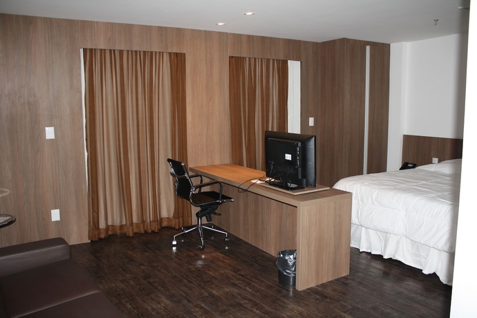 Imagen de la habitación del Hotel San Diego Suites Governador Valadares. Foto 11