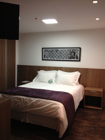 Imagen de la habitación del Hotel San Diego Suites Governador Valadares. Foto 13