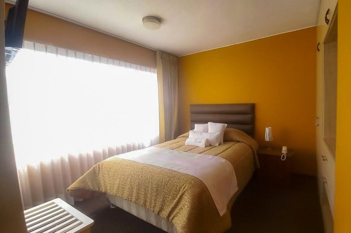 Imagen de la habitación del Hotel San Felipe Suites. Foto 14
