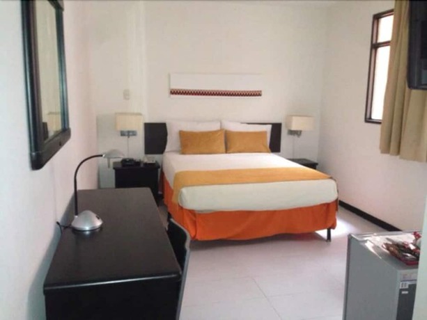 Imagen de la habitación del Hotel San Fermin Pereira. Foto 13