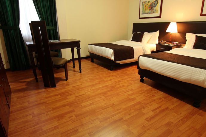 Imagen de la habitación del Hotel San Fernando Real. Foto 16