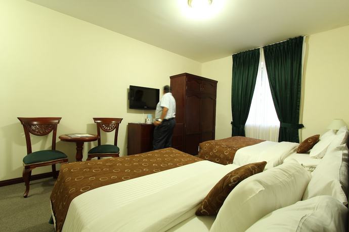 Imagen de la habitación del Hotel San Fernando Real. Foto 17