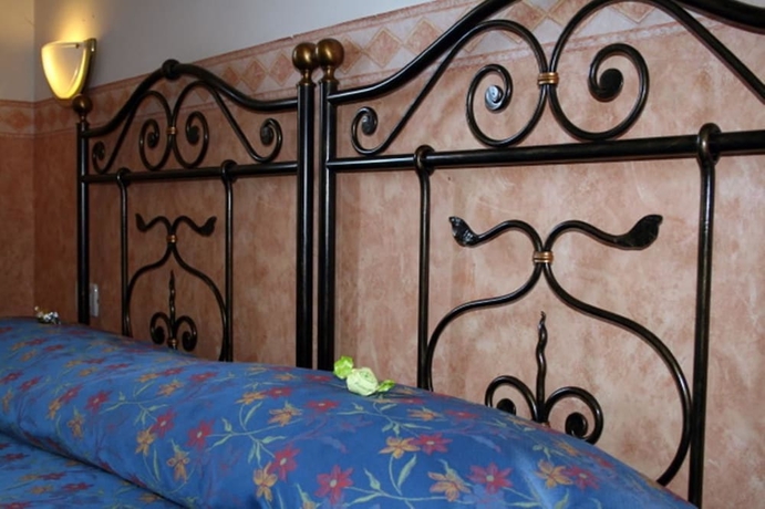 Imagen de la habitación del Hotel San Giorgio, Bolonia. Foto 7