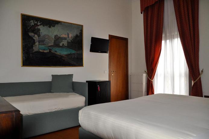 Imagen de la habitación del Hotel San Guido. Foto 7