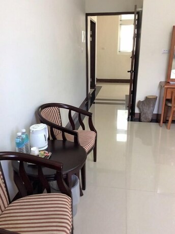 Imagen de la habitación del Hotel San He Inn. Foto 2