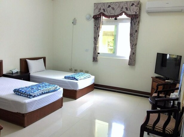 Imagen de la habitación del Hotel San He Inn. Foto 3