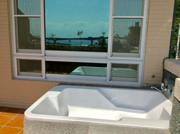 Imagen de la habitación del Hotel San He Inn. Foto 4