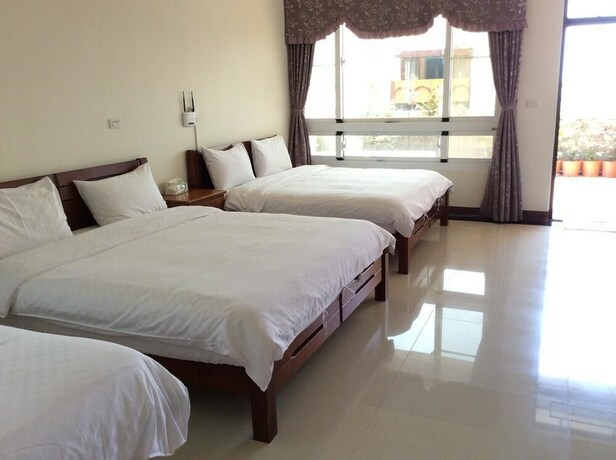 Imagen de la habitación del Hotel San He Inn. Foto 5