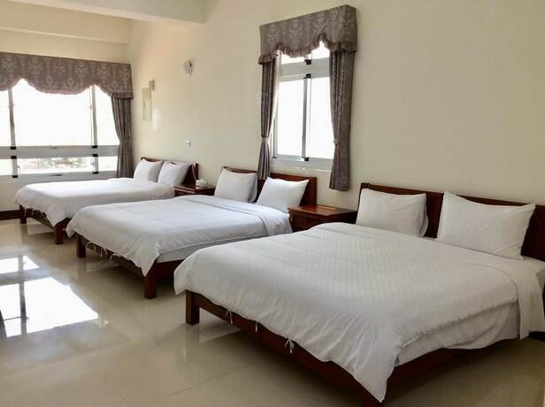 Imagen de la habitación del Hotel San He Inn. Foto 6