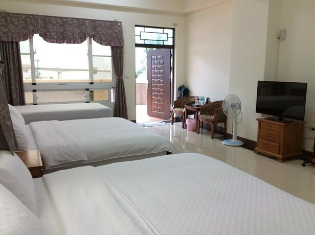 Imagen de la habitación del Hotel San He Inn. Foto 7