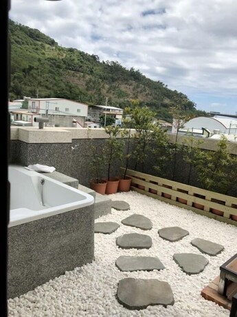 Imagen de la habitación del Hotel San He Inn. Foto 10