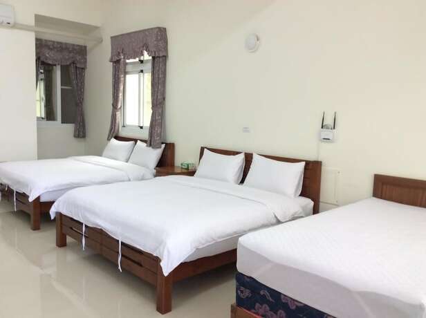 Imagen de la habitación del Hotel San He Inn. Foto 11