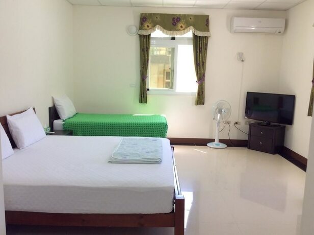 Imagen de la habitación del Hotel San He Inn. Foto 14