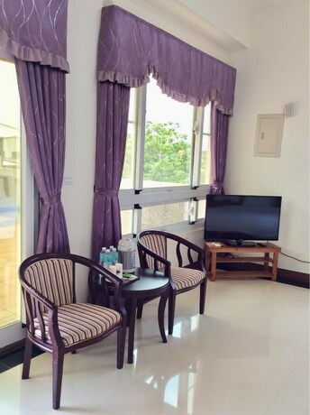 Imagen de la habitación del Hotel San He Inn. Foto 15