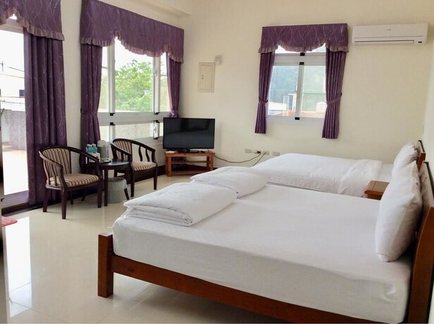 Imagen de la habitación del Hotel San He Inn. Foto 16