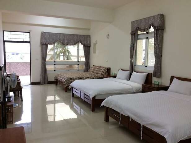 Imagen de la habitación del Hotel San He Inn. Foto 17