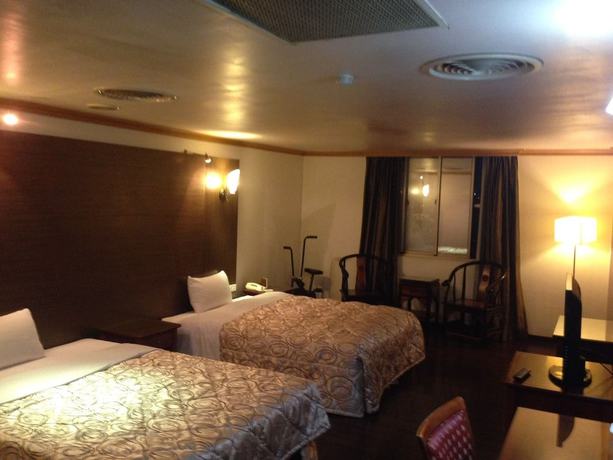 Imagen de la habitación del Hotel San Ho Business. Foto 11