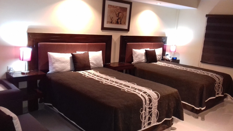 Imagen de la habitación del Hotel San Ignacio Inn. Foto 10