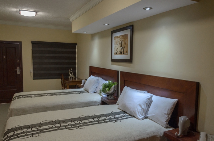 Imagen de la habitación del Hotel San Ignacio Inn. Foto 13