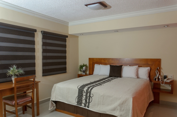 Imagen de la habitación del Hotel San Ignacio Inn. Foto 15