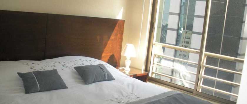 Imagen de la habitación del Hotel San Ignacio Suite Apartments. Foto 5