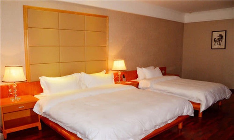 Imagen de la habitación del Hotel San Jiang Grand. Foto 13