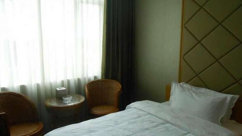 Imagen de la habitación del Hotel San Jiang Grand. Foto 14