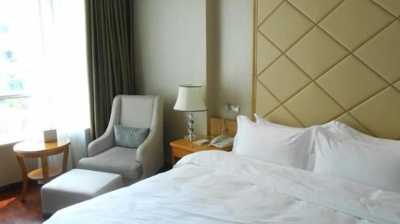 Imagen de la habitación del Hotel San Jiang Grand. Foto 16