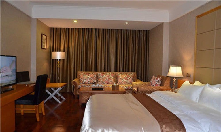 Imagen de la habitación del Hotel San Jiang Grand. Foto 18
