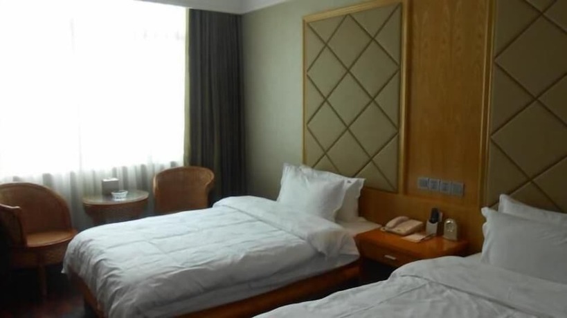 Imagen de la habitación del Hotel San Jiang Grand. Foto 21