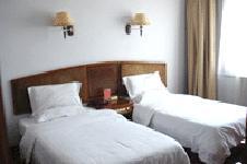 Imagen de la habitación del Hotel San Jiang Yuan. Foto 3