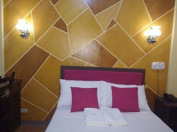 Imagen de la habitación del Hotel San Juan Suites. Foto 22