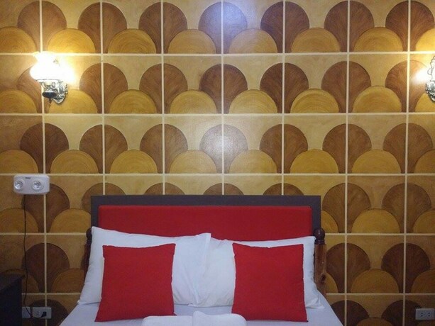 Imagen de la habitación del Hotel San Juan Suites. Foto 25