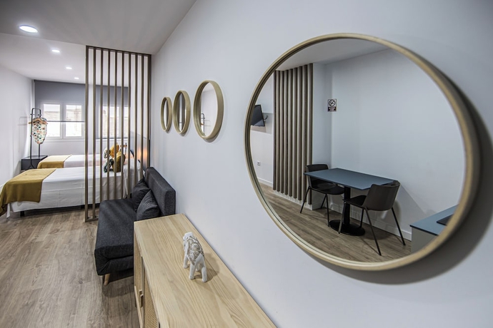 Imagen de la habitación del Hotel San Juan Suites. Foto 1
