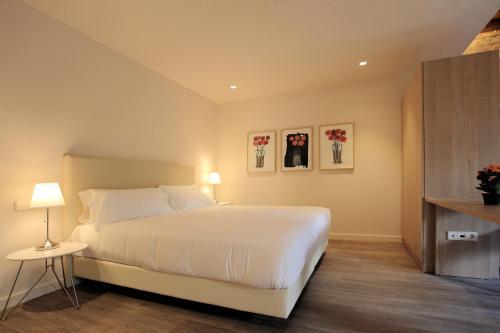 Imagen de la habitación del Hotel San Lorenzo Suites. Foto 4