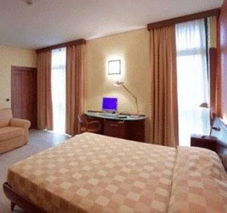 Imagen de la habitación del Hotel San Marco, CARMAGNOLA. Foto 4
