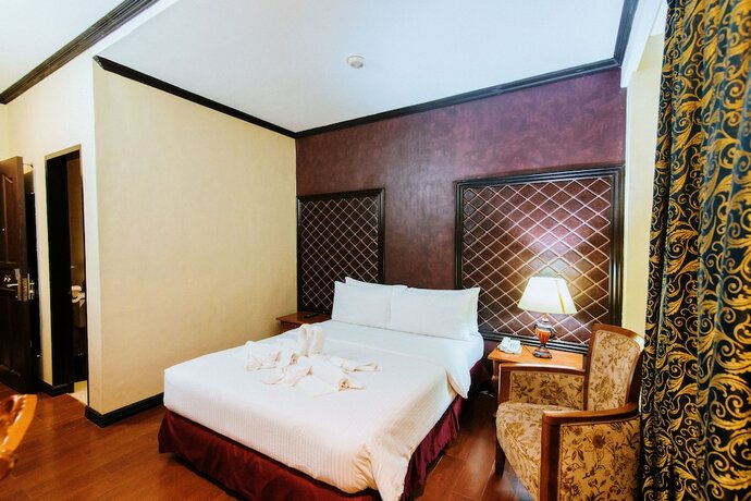 Imagen de la habitación del Hotel San Marco, General Santos. Foto 19