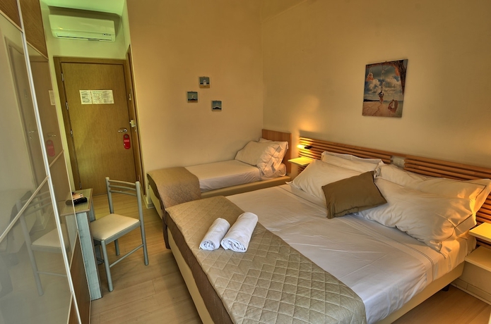 Imagen de la habitación del Hotel San Marco Marotta. Foto 5